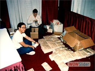 Paul & Gilbert count wares before a show